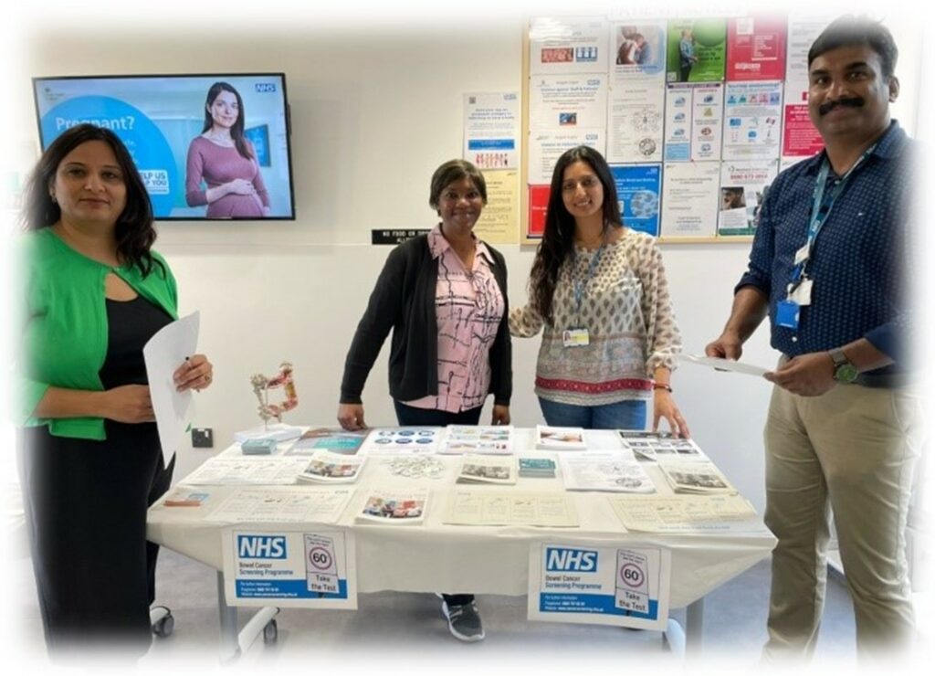 A health improvement specialist collaborating with a local GP surgery to interact with local people about the NHS bowel cancer screening programme in London. 